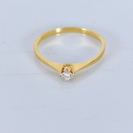 RING, 18 karat rödguld med åttkanstslipad diamant, stämplad Guldfynd u å. på auktion hos Halmstads Auktionskammare