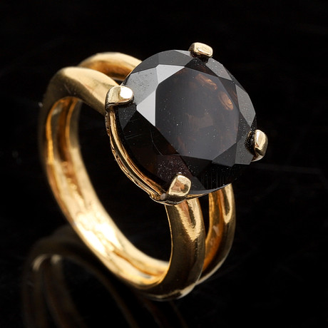 RING, 14 K guld. Slipad rökkvarts. vikt 6,5 gram. 14 karat. på auktion hos Crafoord Auktioner Malmö