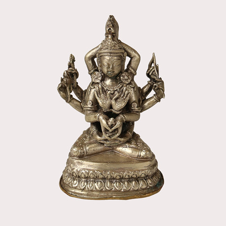 SKULPTUR, brons och vitmetall Bodhisattva med 12 armar, 1900- tal. på auktion hos Limhamns Auktionsbyrå