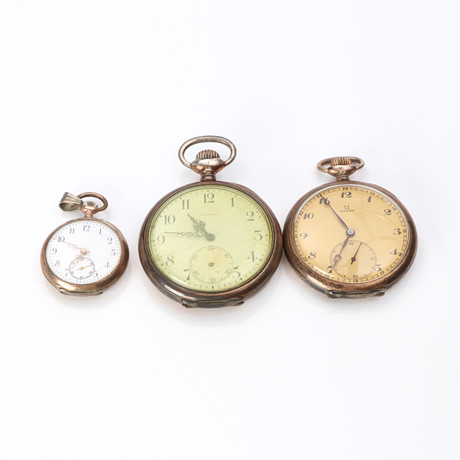 FICKUR, TRE ST. Silver, bl.a. Omega och Zenith. på auktion hos Skånes Auktionsverk
