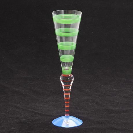 ANNE NILSSON. Champagneglas, glas, "clown", Orrefors. på auktion hos RA Auktionsverket Norrköping