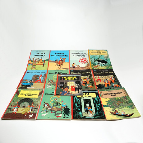 SERIEBÖCKER, TINTIN, 13 st, varav en med hård pärm, Rackham den Rödes skatt. på auktion hos Kalmar Auktionsverk