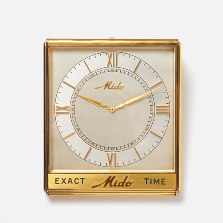 MIDO (Swiss), bordsur/desk clock, Exact Mido Time, "rättidsur", 245 x 208, 30-83 mm, metall, omkring 1900-tale på auktion hos Stockholms Auktionsverk Sickla