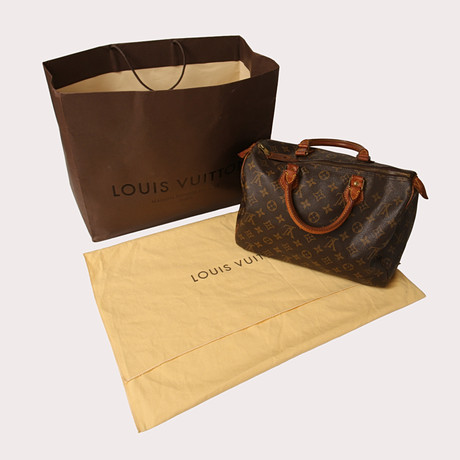 LOUIS VUITTON, handväska, "Speedy 30". Juni 1991 France. på auktion hos Limhamns Auktionsbyrå