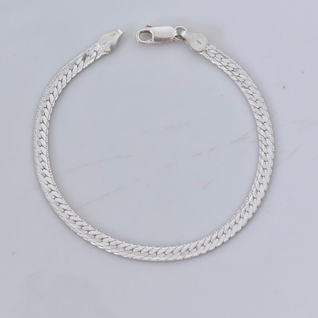 ARMBAND, sterlingsilver, Italien. på auktion hos Halmstads Auktionskammare