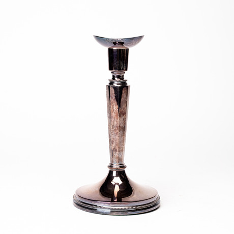 ERIC LÖFMAN. Ljusstake, silver, stämpelsignerad, K G Markströms Guldsmeds Ab, Uppsala, 1976. på auktion hos Auktionshuset Kolonn