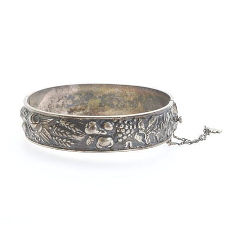 ARMRING, silver. på auktion hos RA Auktionsverket Norrköping