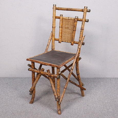 STOL, kolonial stil, bambu med metalldetaljer, runt 1900. på auktion hos Markus Auktioner