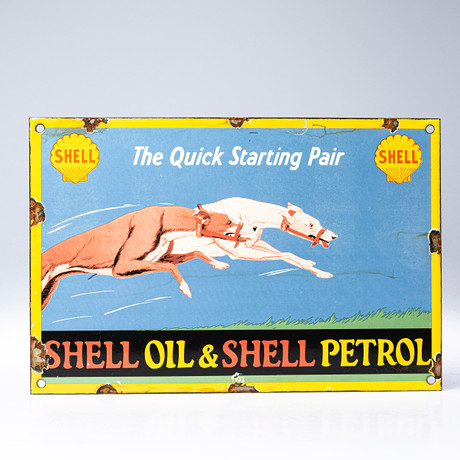 Emaljskylt Shell Oil & Shell Petrol. på auktion hos Handelslagret Auktionsservice