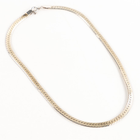 HALSBAND. Silver, flätad länk. på auktion hos Karljohan Auktioner