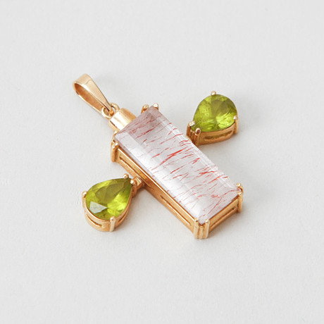 HÄNGE, 18k guld, baguettslipad kvarts samt peridoter, vikt ca 9,2 gram. på auktion hos Göteborgs Auktionsverk