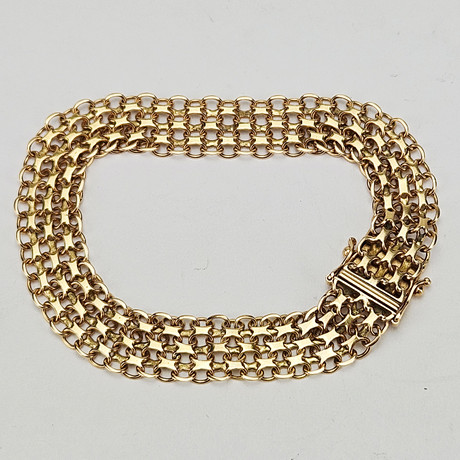 ARMBAND, "X-länk", guld, 18K, Ädelsmycken Aktiebolag, Stockholm, vikt ca. 17,6 gram. på auktion hos Auktionshuset Thörner & Ek