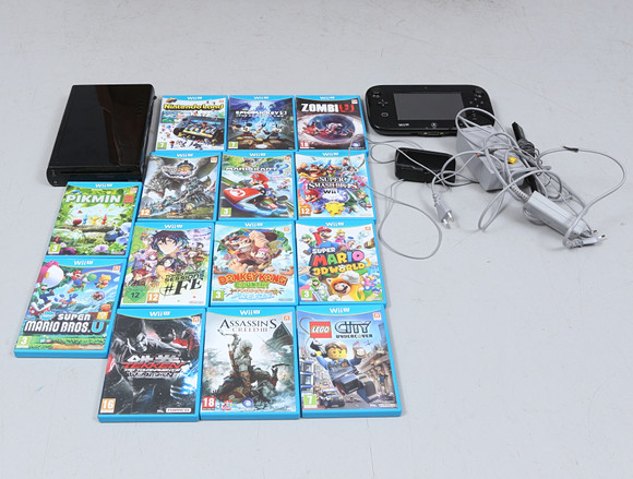 SPELKONSOL, wup-010, wup-101, 14 spel, Nintendo. på auktion hos Gomér & Andersson Linköping
