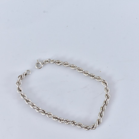 ARMBAND, sterlingsilver, Cordell. på auktion hos Halmstads Auktionskammare