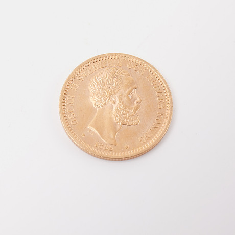 MYNT, 21,6 k guld, Oscar II, 20 kronor, 1889. på auktion hos Stockholms Auktionsverk Sickla