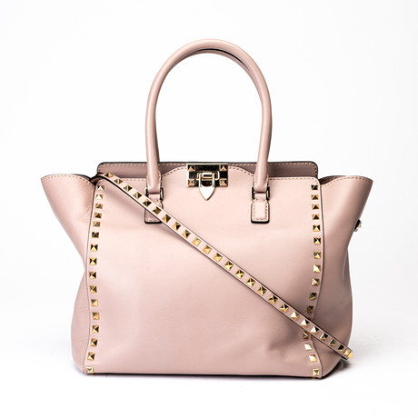 VALENTINO. Handväska, "Valentino Garavani Rockstud Trapeze Tote, Italien. på auktion hos Auktionshuset Kolonn