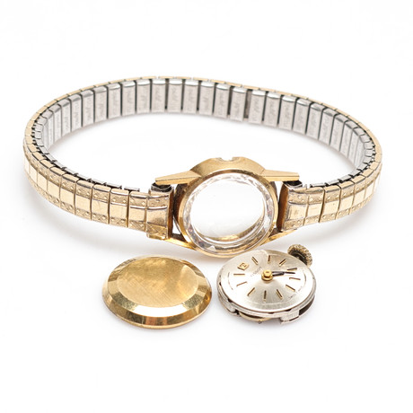 ARMBANDSUR/SKROT, 18K, Tissot, guld, vikt bakboett 1,7gram. på auktion hos Gomér & Andersson Linköping