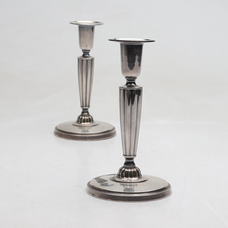 C.G. HALLBERG. ljusstakar, 1 par, silver, Stockholm, 1955. Totalvikt ca 347 g. på auktion hos Gomér & Andersson Norrköping