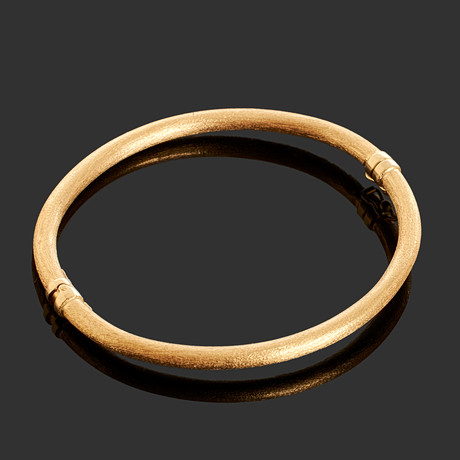 ARMRING, 18K guld, strukturerad yta. på auktion hos Crafoord Auktioner Stockholm