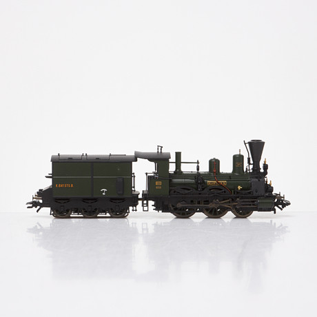 MÄRKLIN H0, ånglok, nr. 37974, i träschatull, i originalkartong. på auktion hos Stockholms Auktionsverk Sickla