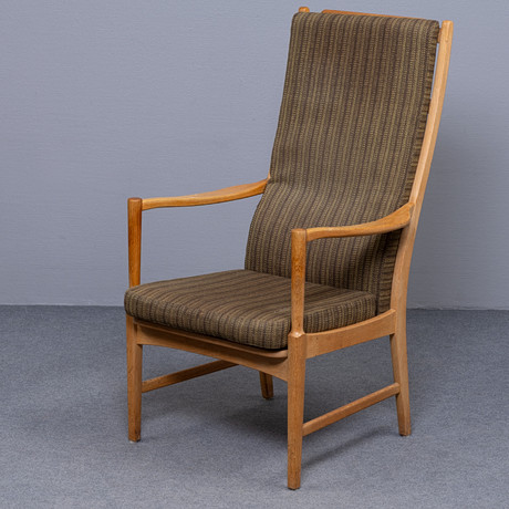 FÅTÖLJ MED HÖG RYGG, EK, 1960-TAL, BJÄRNUM, SWEDEN. på auktion hos Auktionskammaren Sydost Kalmar