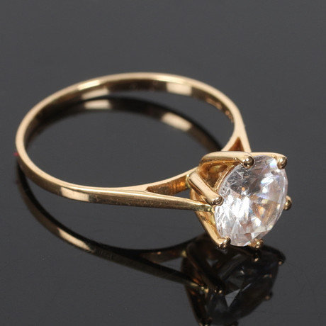 RING, 18k guld, med vit sten. Aso Guld & Smide, Stockholm. 19/2000-tal. på auktion hos Stadsauktion Sundsvall