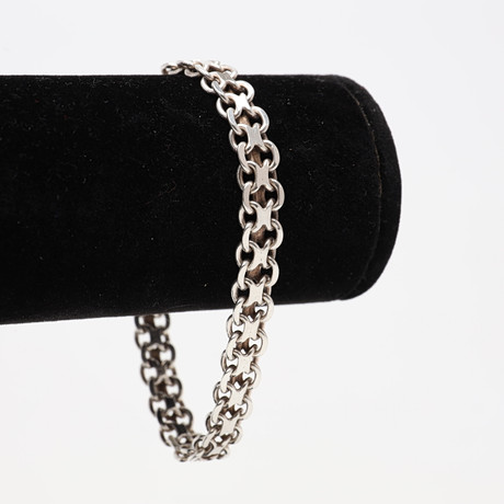 ARMBAND, X-länk, silver, vikt ca 16,4 gram. på auktion hos Borås Auktionshall