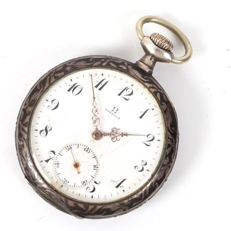 FICKUR, Omega, silver 900, niellodekor med förgyllda inslag, 51 mm. på auktion hos Stadsauktion Sundsvall