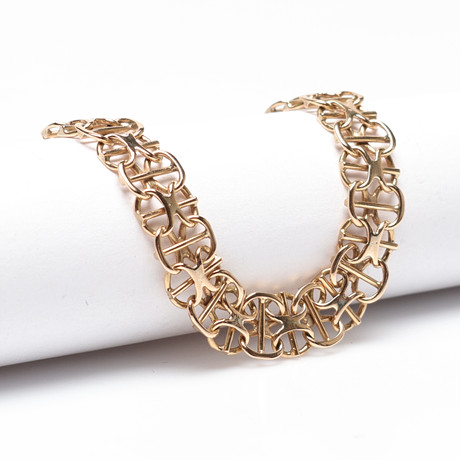 ARMBAND, X-länk, 18k, Guld, vikt cirka 13,4 gram. på auktion hos Gomér & Andersson Linköping