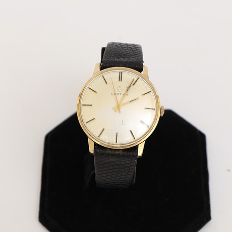 HERRARMBANDSUR, Certina, 14k, guld, armband av läder. på auktion hos Falun Auktionsbyrå