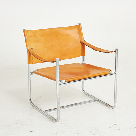 KARIN MOBRING. Safarifåtölj, "Amiral", för Ikea 1971, läder, kromade stålrör. på auktion hos Stockholms Auktionsverk Sickla