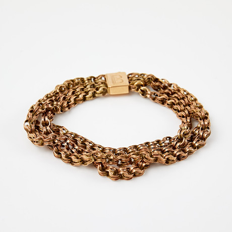 ARMBAND. Kedja 14 k guld, 3-radig, fantasilänk, lås i 9 k guld, utländska stämplar. på auktion hos Stockholms Auktionsverk Sickla