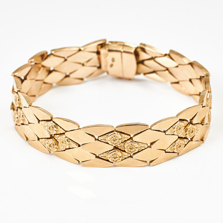 ARMBAND, 18 k guld, fantasilänk, sammanlänkade romber med delvis graverade blomdetaljer, Giovanni Zanolo, (ver på auktion hos Stockholms Auktionsverk Magasin 5