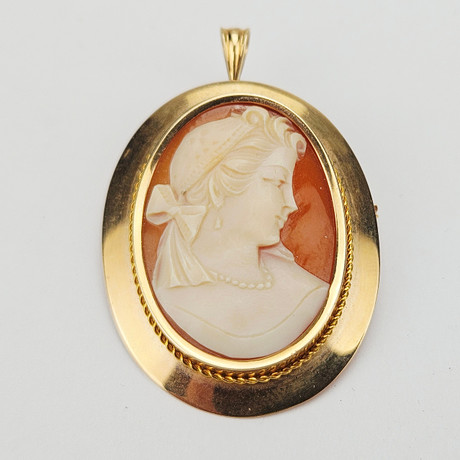 BROSCH/HÄNGE, guld, 18K, med camé, GD& Co, Malmö 1956, total vikt ca. 6,7 gram. på auktion hos Auktionshuset Thörner & Ek