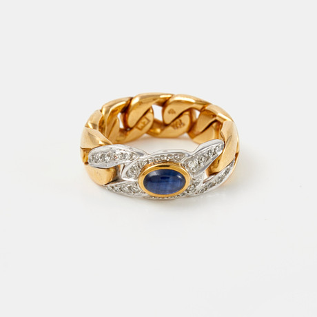 RING, 18 k röd- samt vitguld, 1 cabochonslipad safir med svag chatoyance, dekor av åttkantslipade diamanter, t på auktion hos Stockholms Auktionsverk Sickla