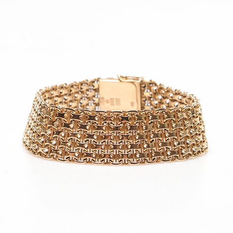 ARMBAND, X-länk., 18K, Guld, vikt cirka 38,2 gram. på auktion hos Gomér & Andersson Linköping
