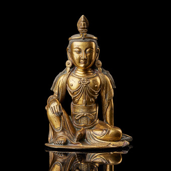A GILT BRONZE FIGURE OF AVALOKITESHVARA.