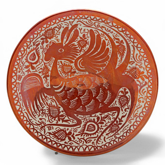 Plato en loza de reflejo metálico, h...