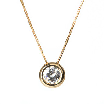 HÄNGE, 18K guld med briljantslipad diamant totalt ca 0....