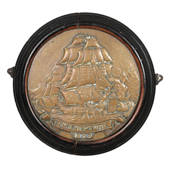 A LARGE BRONZE SHIP'S PLAQUE NAMED HMS NEPTUNE.