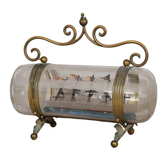 AN EARLY 20TH CENTURY FRENCH SHIP IN A CANISTER/BOTTLE.