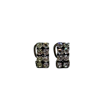 DEUX CLIPS D'OREILLES EN ARGENT 835 SERTIS DE ZIRCONS.