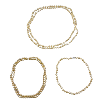 Set of three cream-coloured pearl necklaces