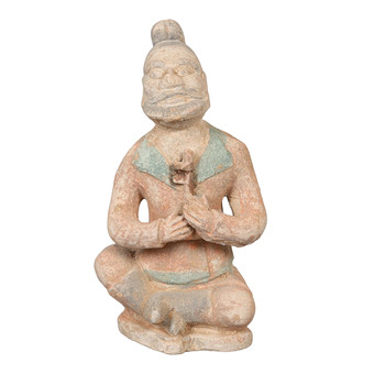 A CHINESE TERRACOTTA FIGURE OF A BEARDED MAN.
