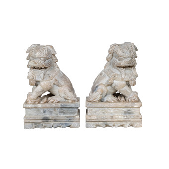 A PAIR OF SOAPSTONE FOO DOGS (2).