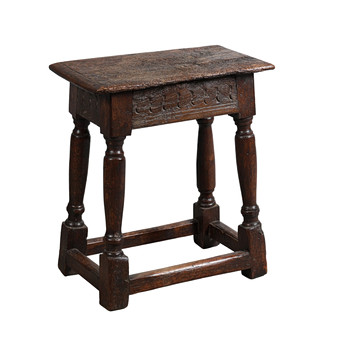 A 17TH CENTURY AND LATER OAK JOINT STOOL.