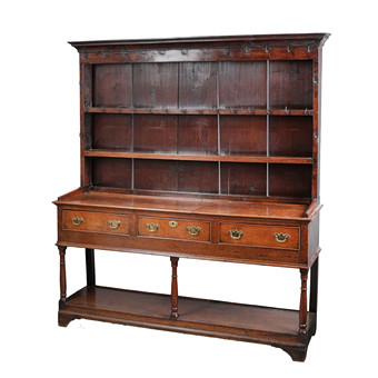 A GEORGE III & LATER OAK DRESSER & RACK.