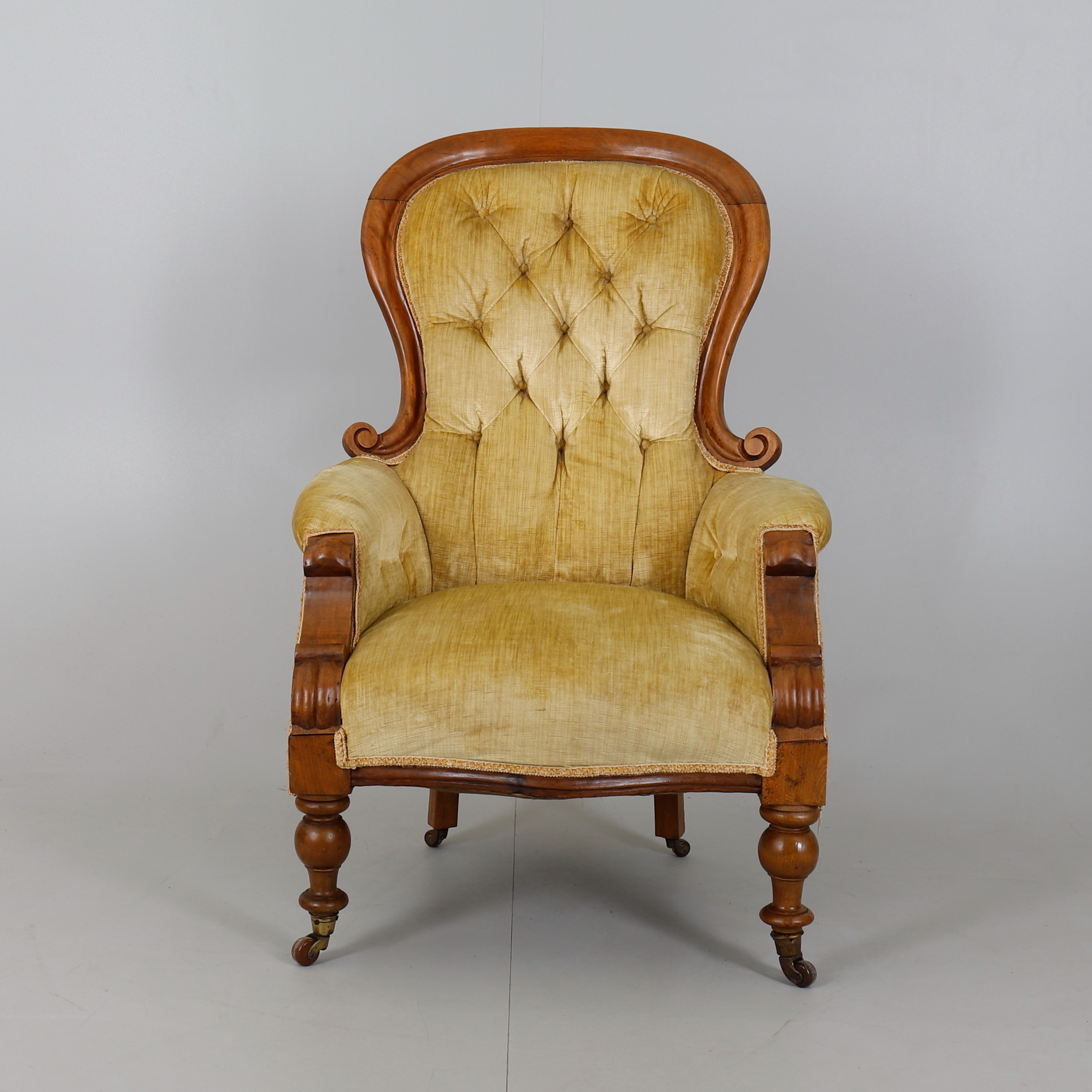 A Victorian Walnut Upholstered Spoon Back Nursing Chair