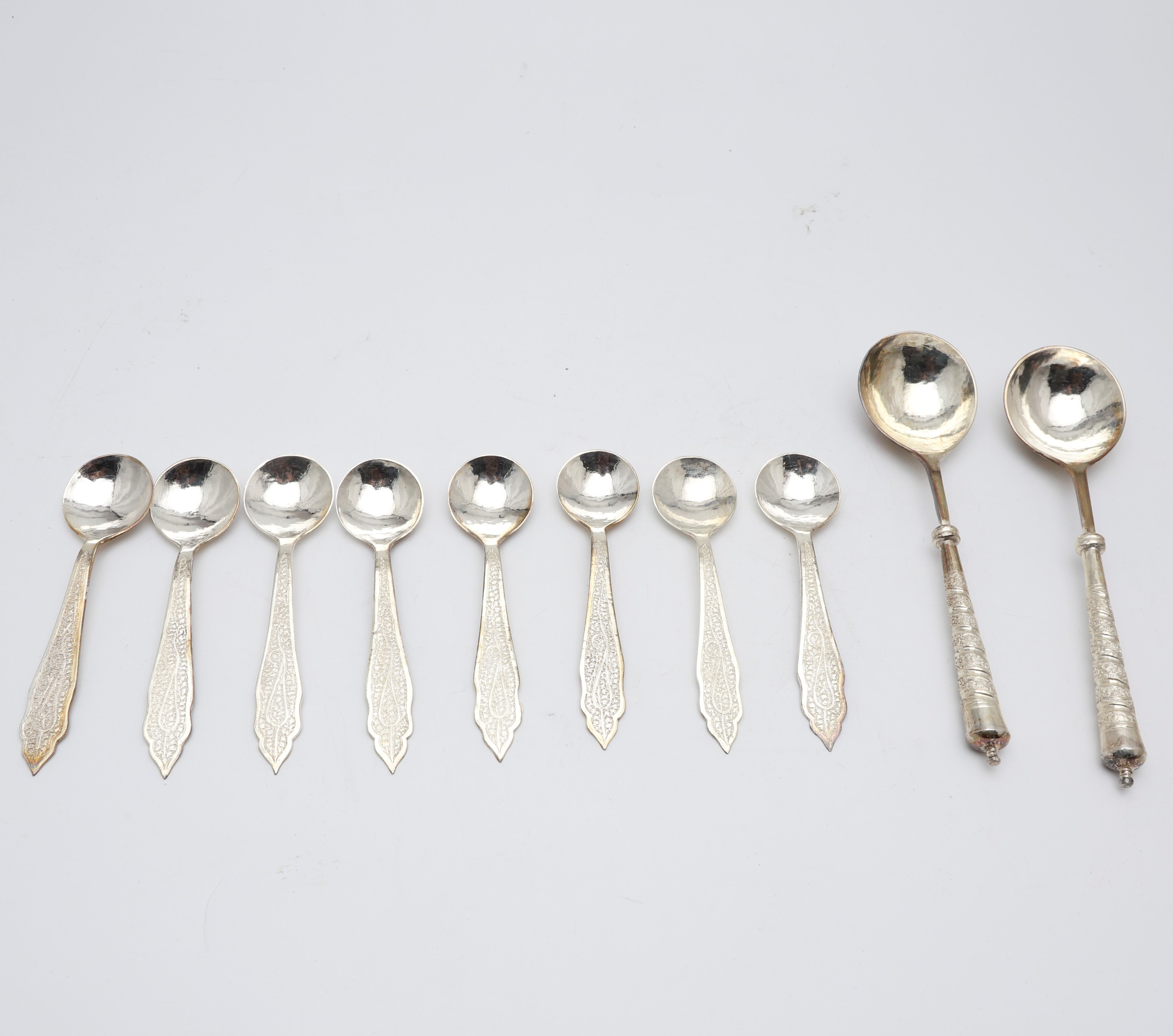 Images for 2029829. Set of eight spoons and set of two Indian serving spoons in silver, 20th