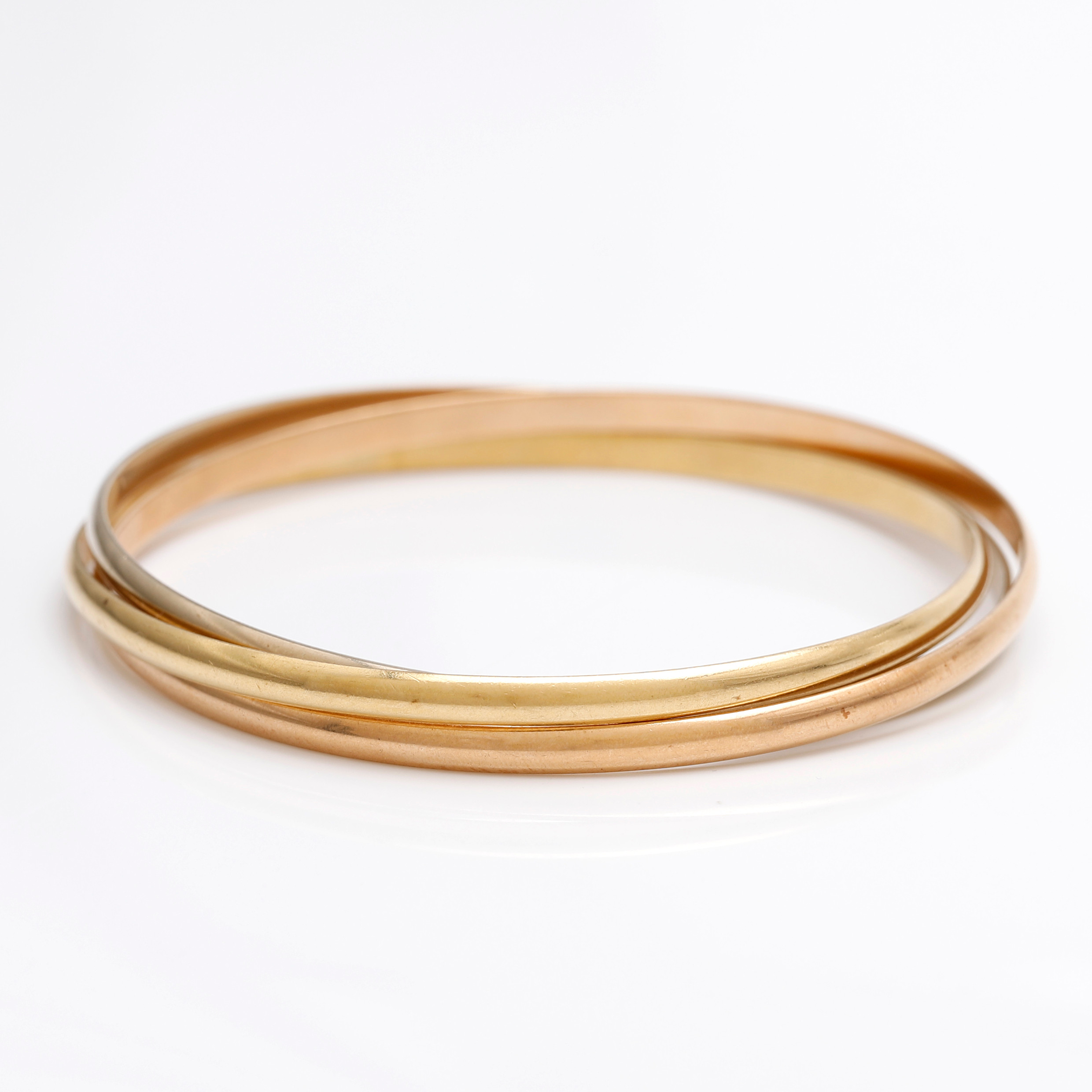 CARTIER. Trinity slave bracelet in 